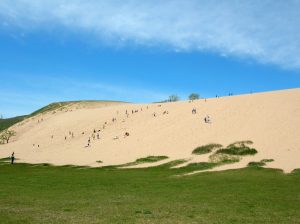 Discover Sleeping Bear Dunes National Lakeshore, scenic drives, beaches, hiking trails, and breathtaking Lake Michigan views.