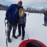 Uncle Jeff and cousin Angelyn snowtubing Traverse City